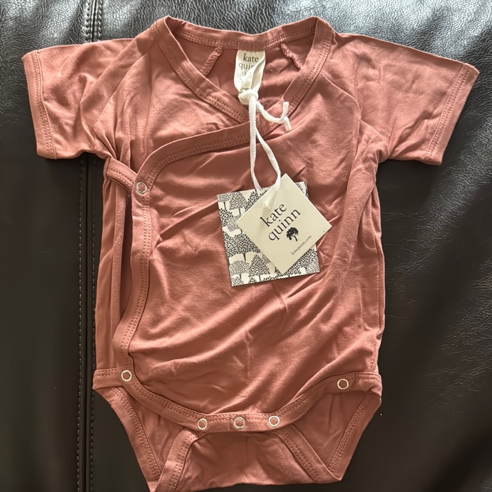Kate Quinn Onesie
